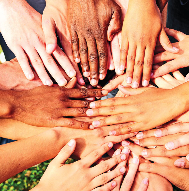 Photo of hands together in unity
